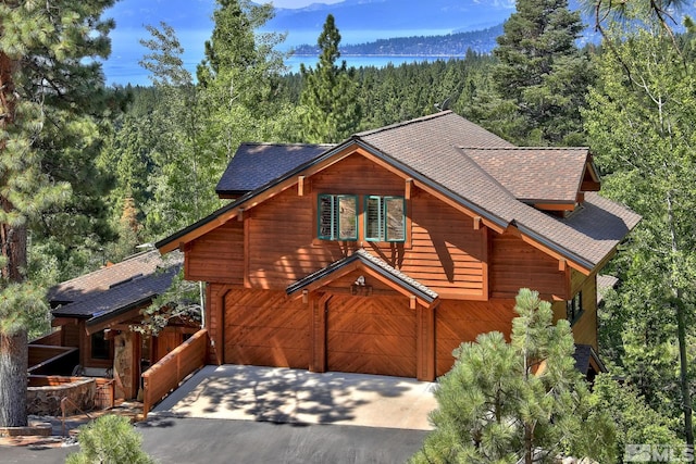 cabin featuring a garage