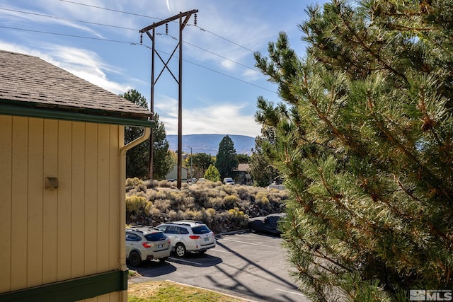 view of parking / parking lot with a mountain view