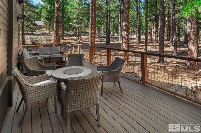 deck featuring an outdoor living space