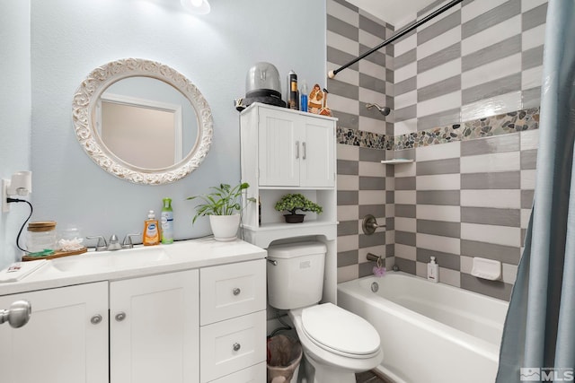 full bathroom featuring toilet, shower / tub combo, and vanity