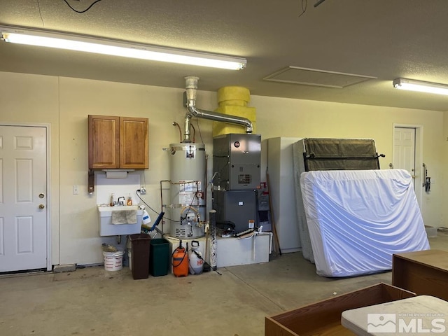 utility room featuring sink and gas water heater