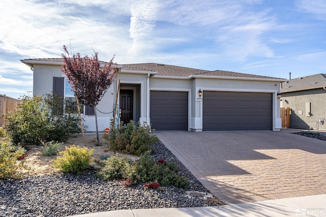 view of front of property with a garage