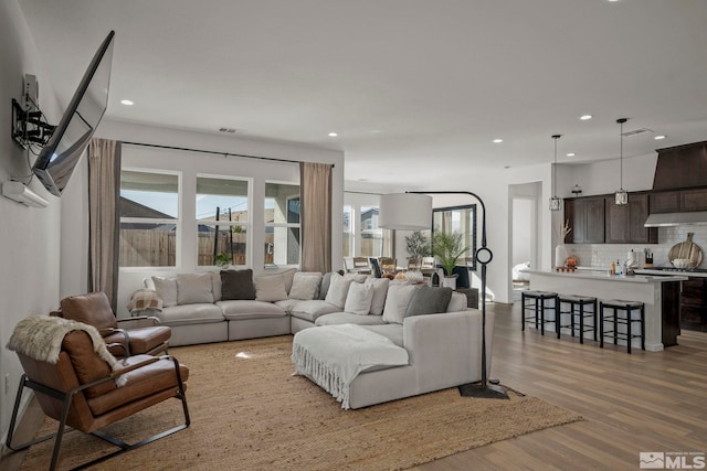 living room with hardwood / wood-style floors