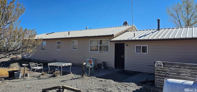 rear view of property with a patio