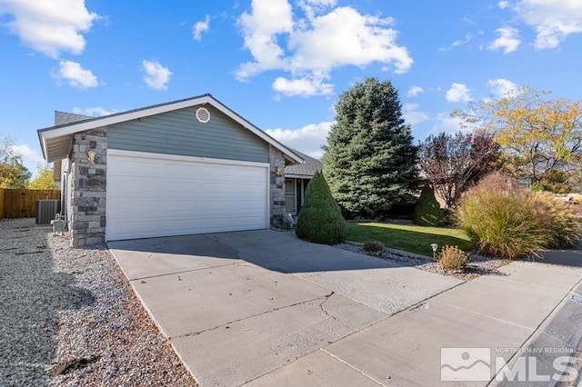 single story home featuring a garage