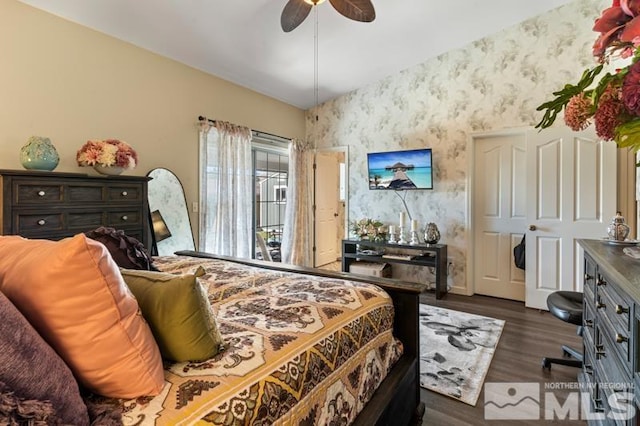 bedroom featuring dark wood-type flooring and ceiling fan