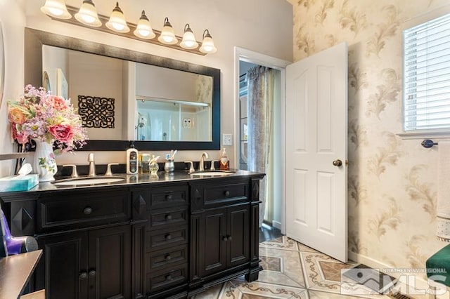 bathroom with vanity and tile patterned floors