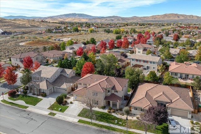 bird's eye view with a mountain view