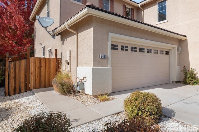 view of home's exterior with a garage