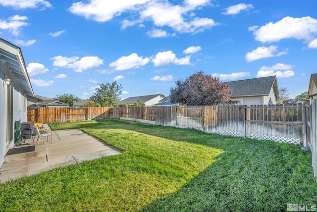 view of yard with a patio area