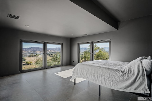 bedroom with a mountain view