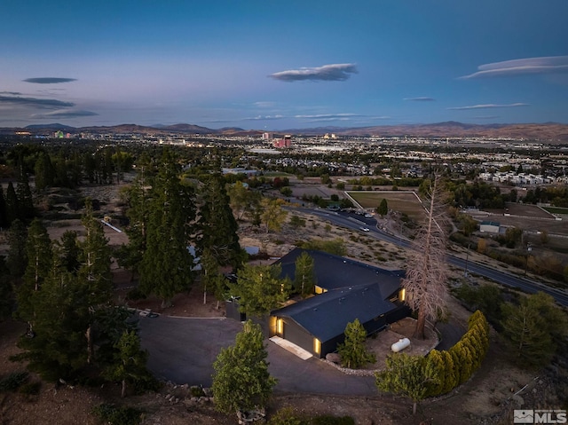 aerial view at dusk with a mountain view