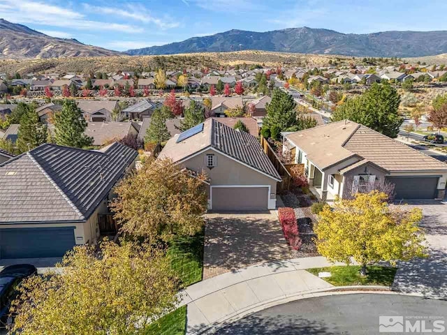 drone / aerial view featuring a mountain view