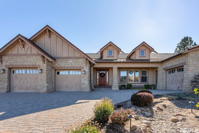 craftsman inspired home with a garage