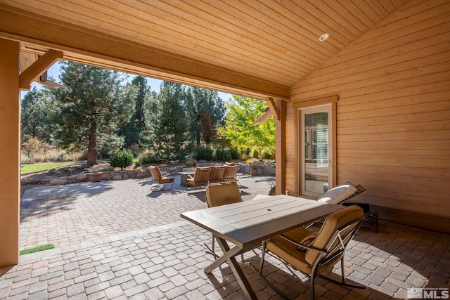 view of patio / terrace with a fire pit