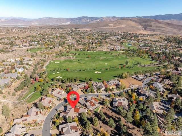 birds eye view of property featuring a mountain view