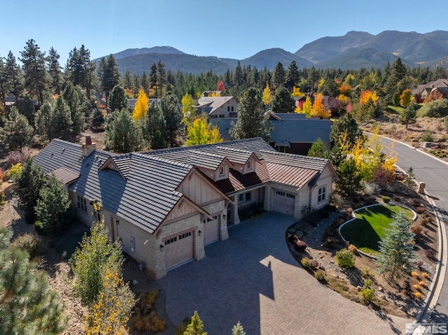 drone / aerial view featuring a mountain view