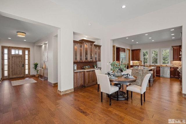 dining room with hardwood / wood-style flooring