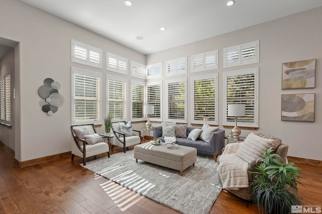 living room with dark hardwood / wood-style floors