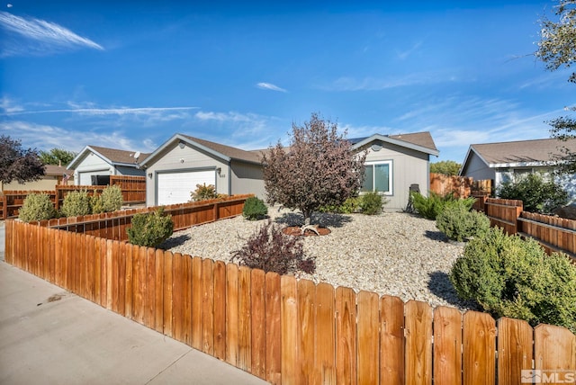 ranch-style home with a garage