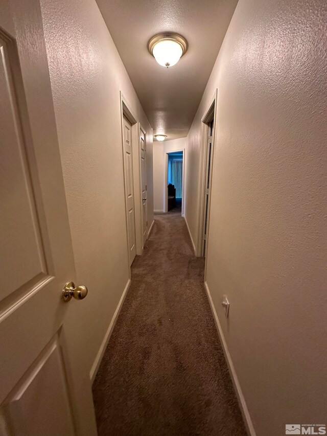 corridor featuring carpet