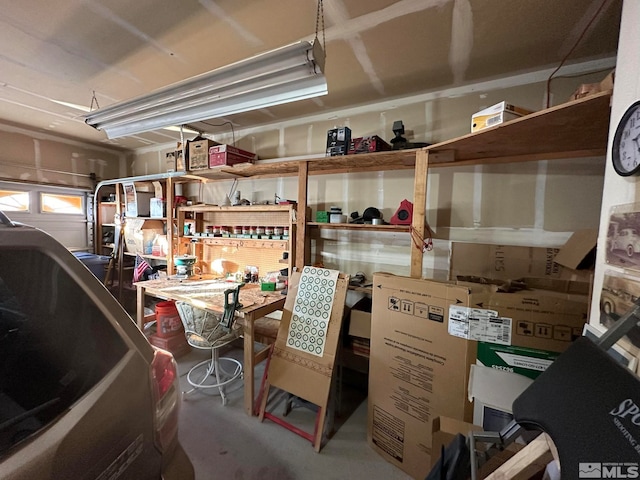 garage with a workshop area