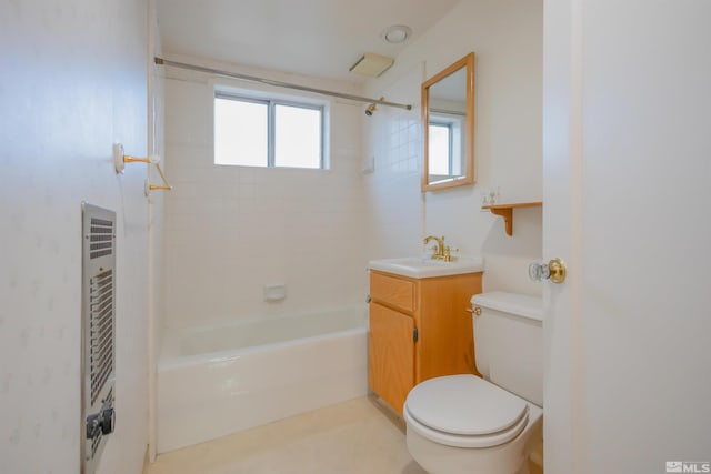 full bathroom with vanity, toilet, and tiled shower / bath