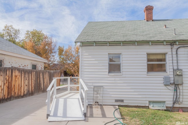 back of house with a patio