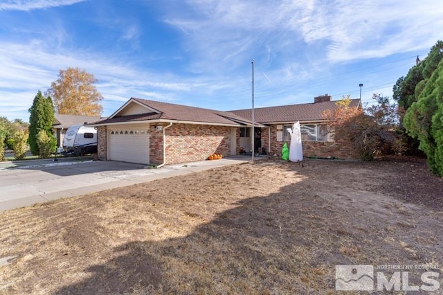 single story home featuring a garage