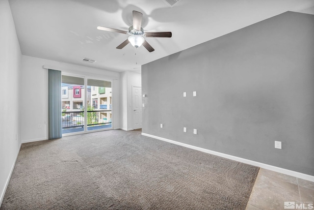 empty room featuring carpet floors and ceiling fan