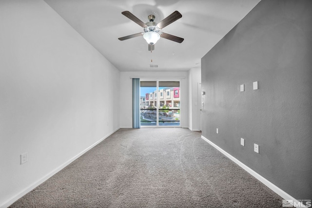 unfurnished room with carpet floors and ceiling fan