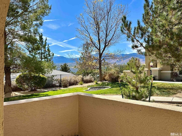 balcony featuring a mountain view