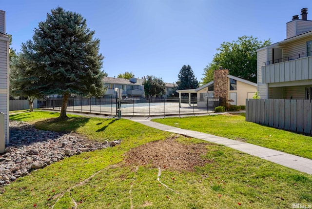 view of yard featuring a balcony