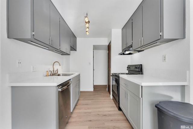 kitchen with black range with electric cooktop, dishwasher, light hardwood / wood-style flooring, and gray cabinetry