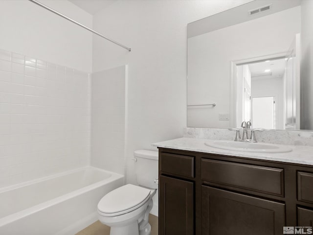 full bathroom with vanity, washtub / shower combination, and toilet