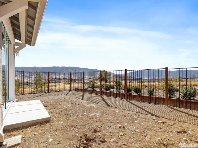 view of yard with a mountain view