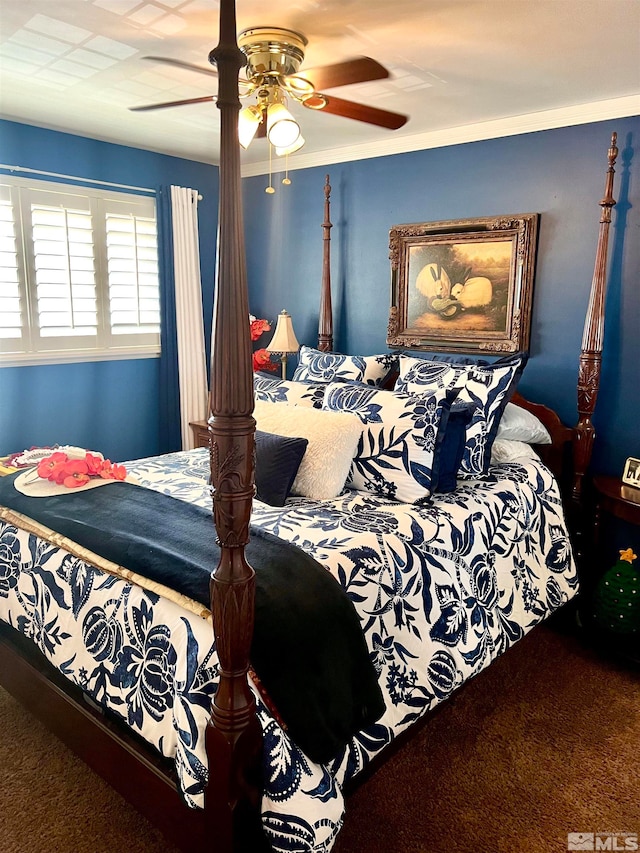 bedroom featuring crown molding, carpet floors, and ceiling fan