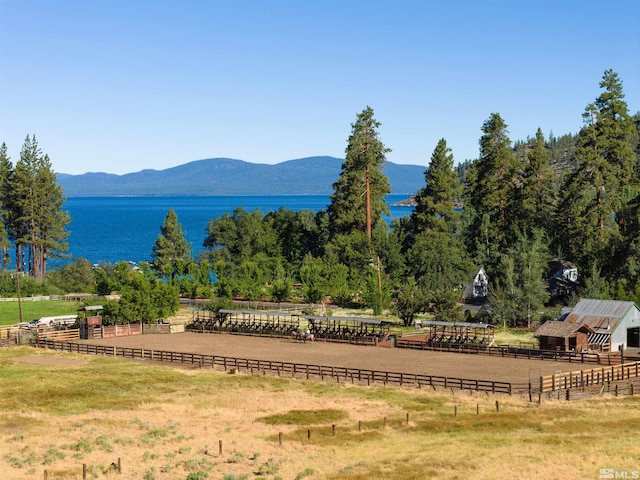 property view of mountains with a water view and a rural view