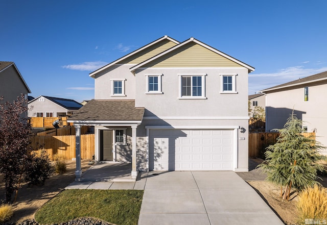 front of property with a garage