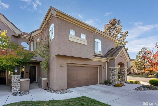 view of front of home featuring a garage