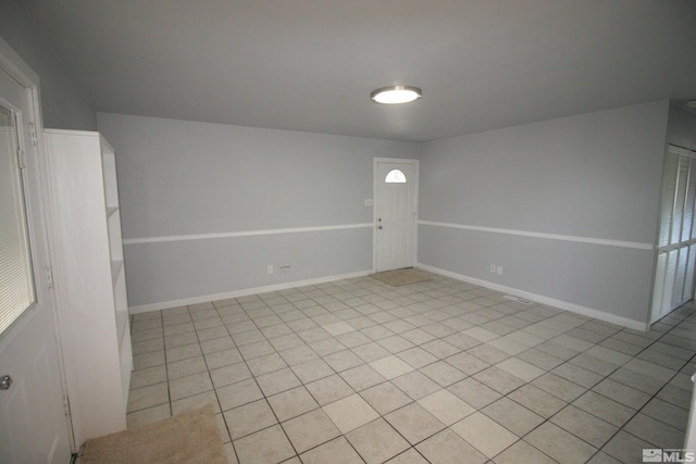 view of tiled spare room