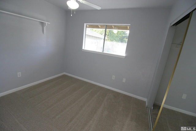 unfurnished bedroom with a closet, carpet flooring, and ceiling fan