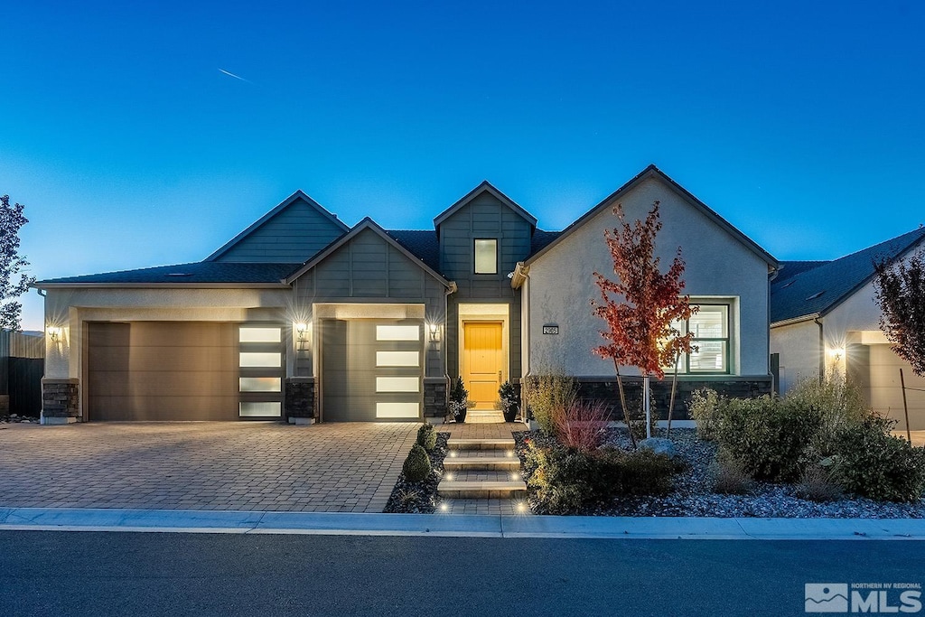 view of front of property with a garage