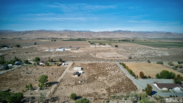 aerial view with a mountain view and a rural view