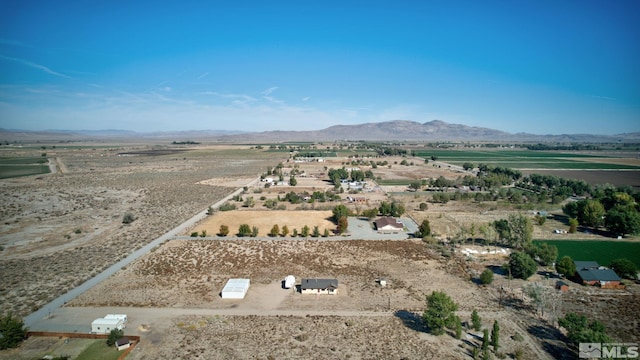 aerial view with a mountain view and a rural view