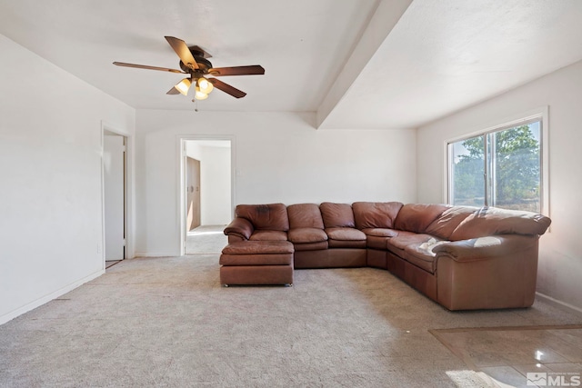 living room featuring light carpet and ceiling fan