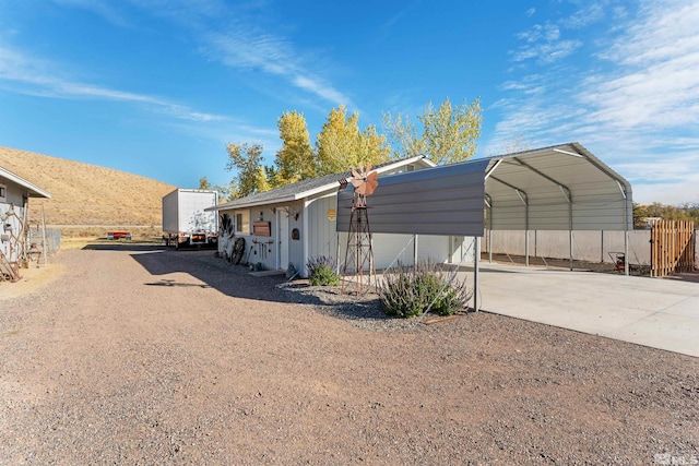 view of front facade featuring a carport