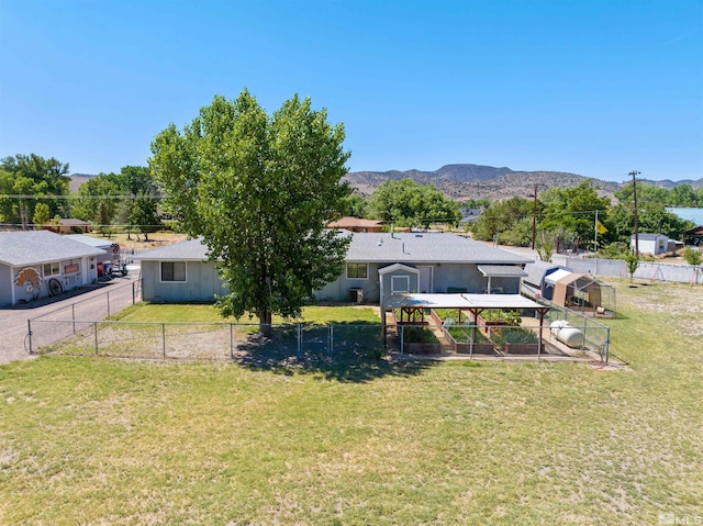 view of yard featuring a gazebo and a mountain view