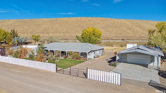 birds eye view of property with a mountain view