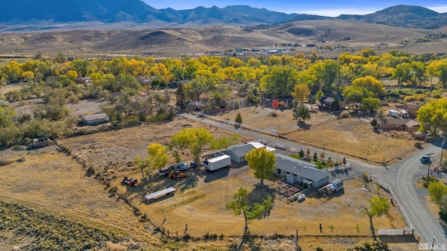 drone / aerial view featuring a mountain view
